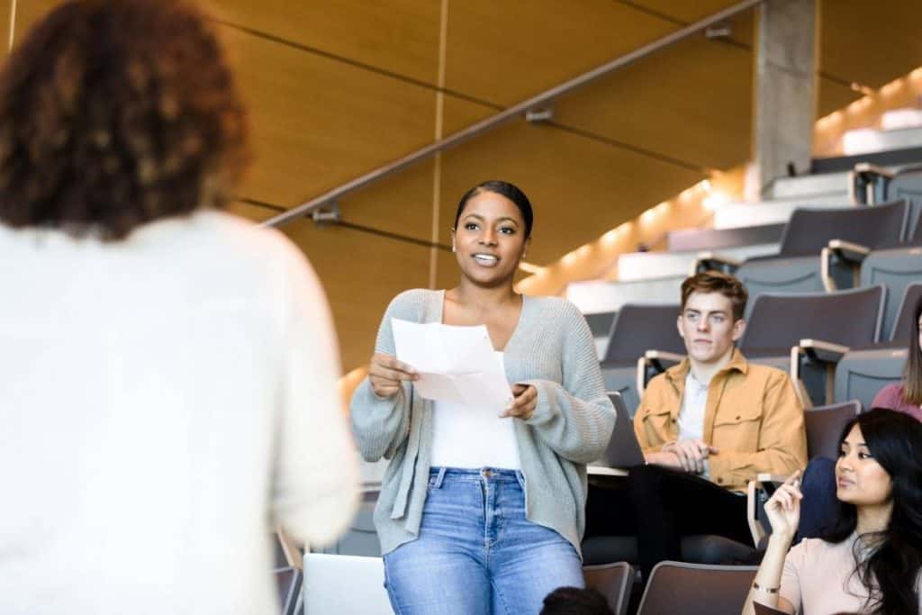 College student giving presentation.